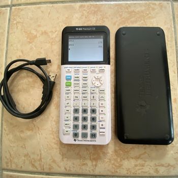 Calculatrice texas instruments Ti 83 prenium ce  avec son câble usb