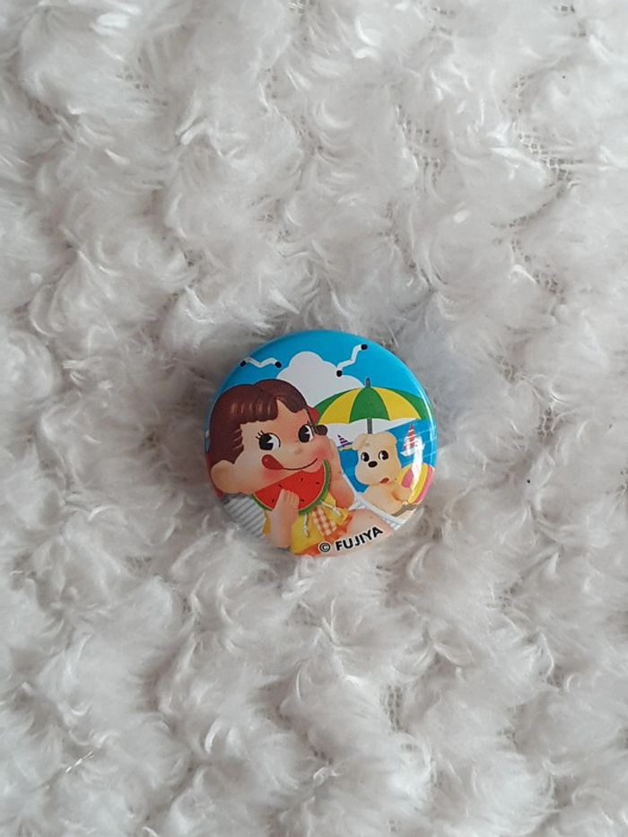 Petit badge peko chan fujiya