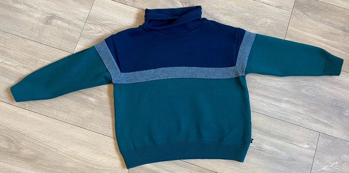 Pull col montant
