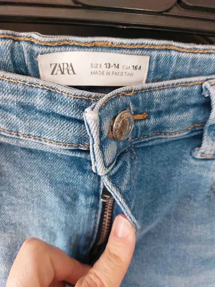 Jeans troué - photo numéro 2
