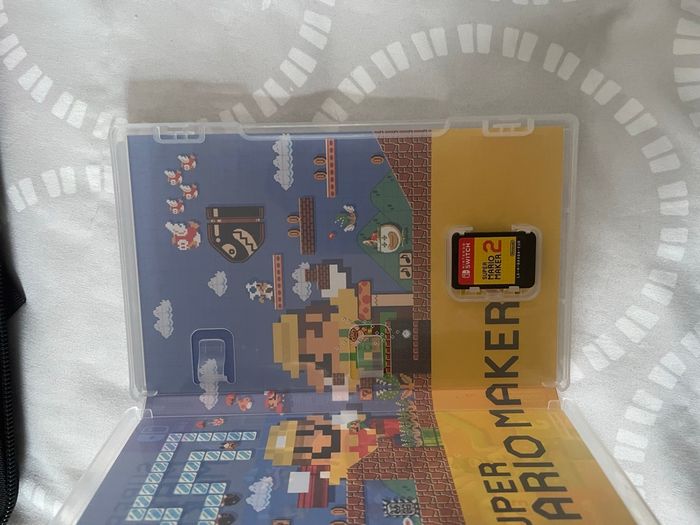 Switch lite rose + Mario - photo numéro 3