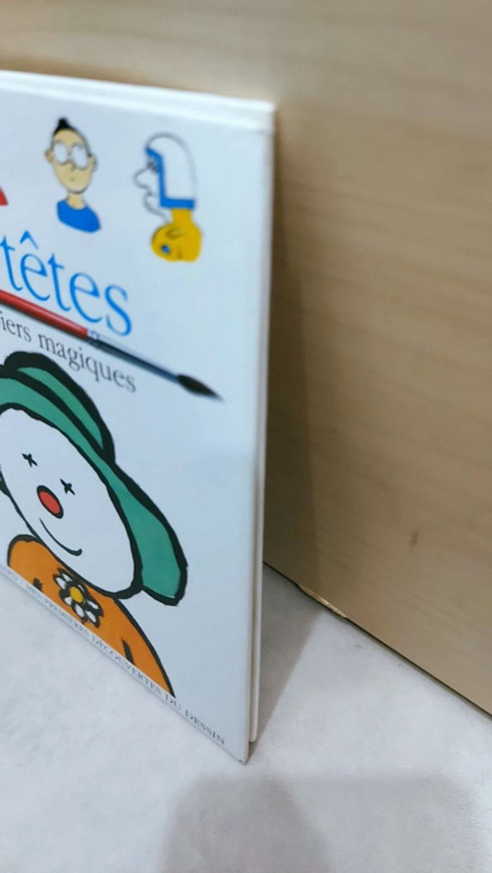 📕 Livre mes premières découvertes : Les têtes, mes papiers magiques - photo numéro 7