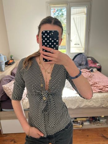 haut decolté avec noeuds à motif 