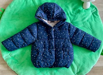 Doudoune bleu avec étoiles 2ans