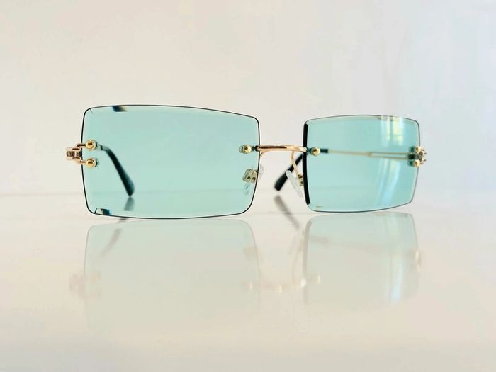 Lunette de soleil mixte percée verres verts uvprotection catégorie 2 - photo numéro 12