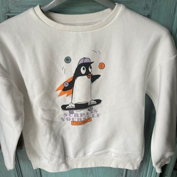 Sweat-shirt blanc avec motifs 8 ans