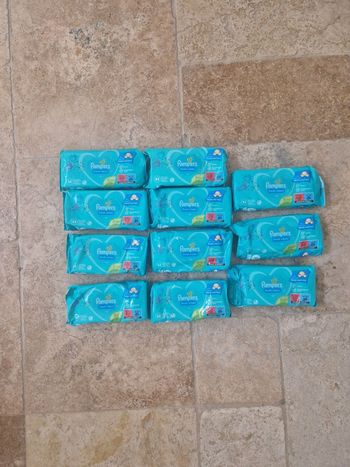 Lot de 11 paquets de lingettes neuves pampers
