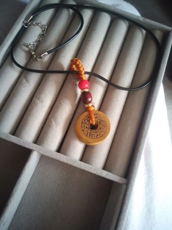 Collier amulette porte bonheur