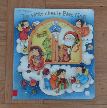 En visite chez le père Noël - livre cartonné