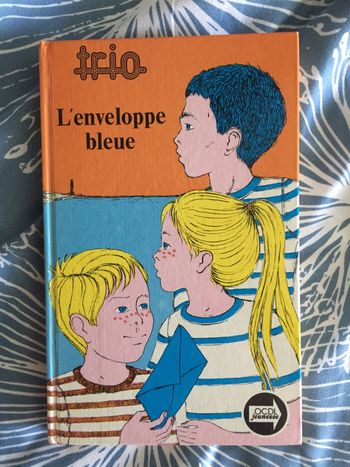 L’enveloppe bleue Trio