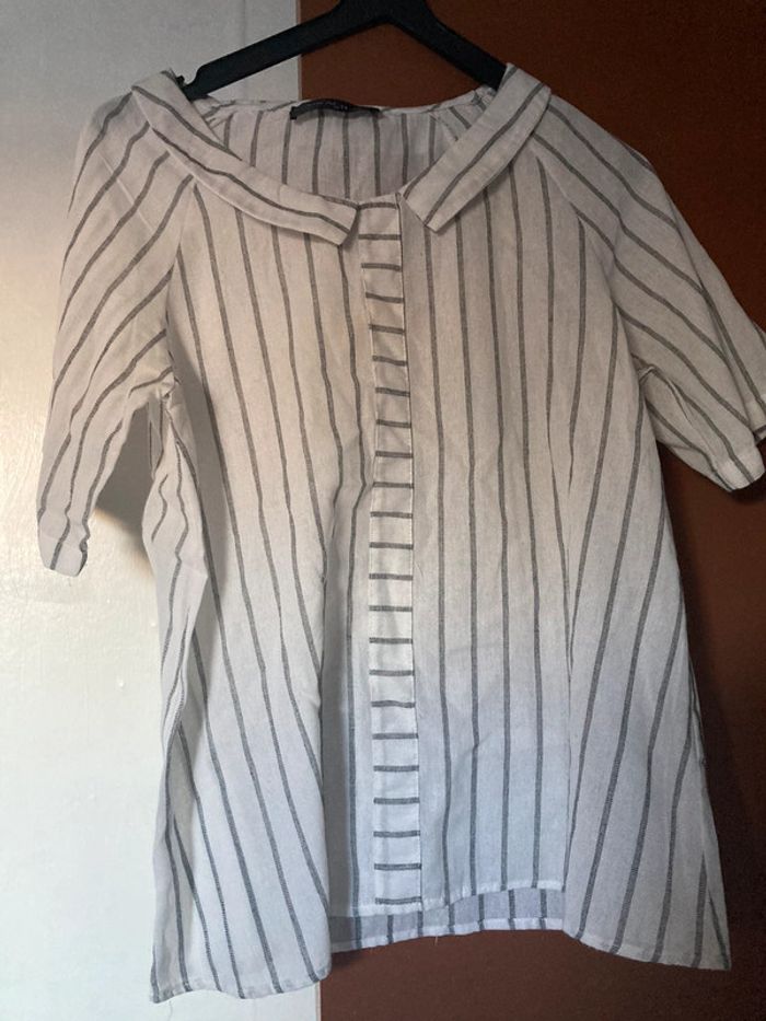 Chemise rayé noir et blanc de marque Gracila taille M.