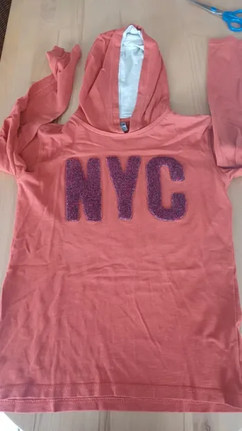 Pull fin tape à l'œil taille 14 ans