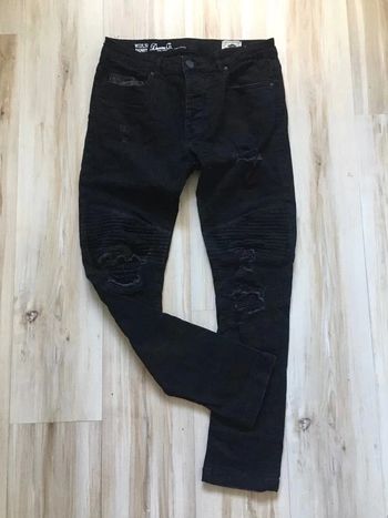 Jean skinny noir pour homme taille L TBE