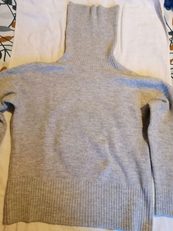 Pull grand col roulé