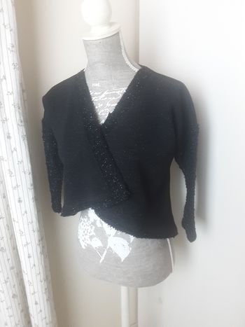 Boléro noir et fils argentés 10 ans