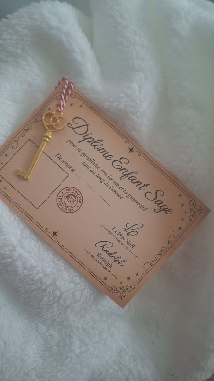 Diplôme et clé magique de Noël