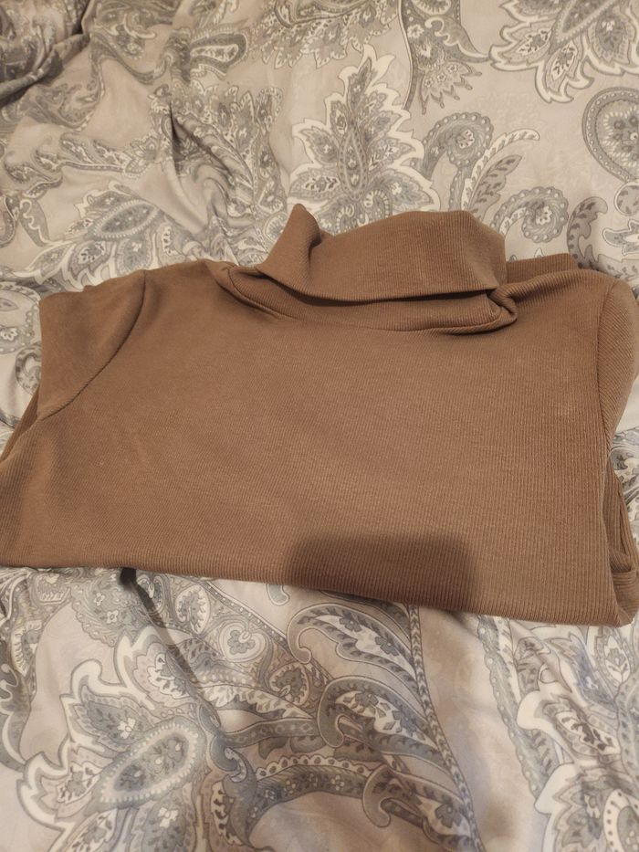 Pull col roulé