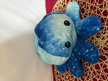 Peluche réversible. Pieuvre bleue et violette galaxie visage joyeux/triste
