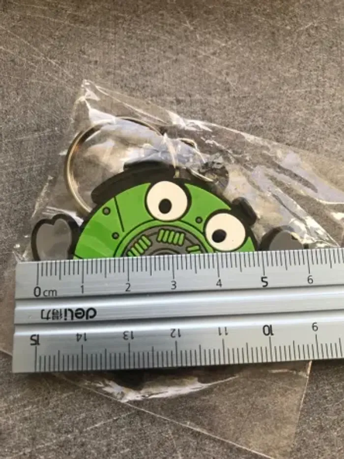porte clé vert neuf toujours en sachet jamais utilisé - photo numéro 3