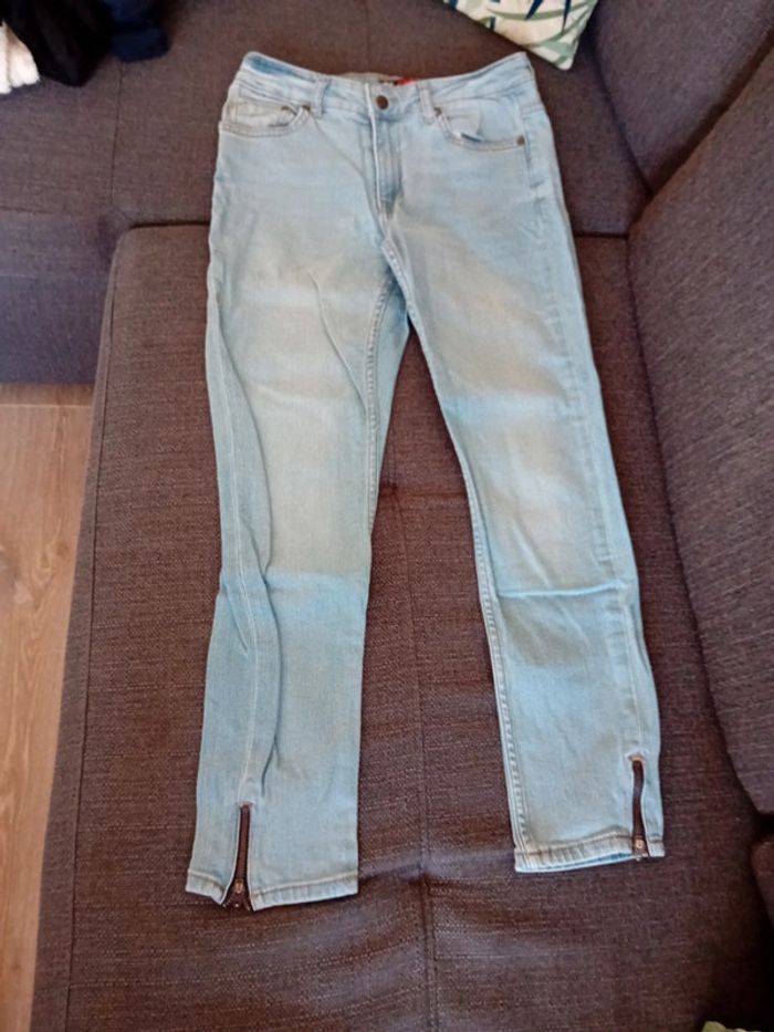 Jean zippé en bas en 34