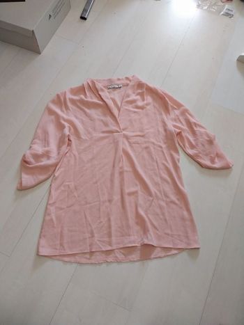 Chemisier rose pâle