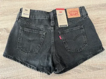 Short en jean noir Levi’s Superlow taille 26 neuf