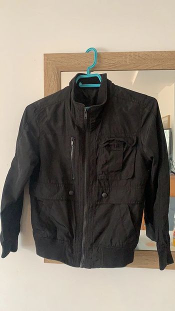 Blouson noir taille 10 ans
