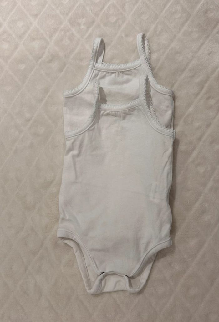 Lot de deux bodys à bretelles, taille 3 mois, Orchestra