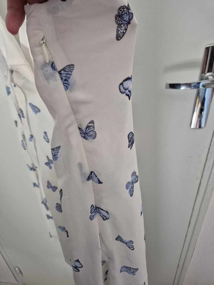 Magnifique robe taille 44 fermeture sur le cote avec papillon - photo numéro 7