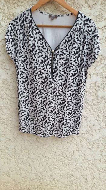 Haut blanc et noir taille L grain de malice