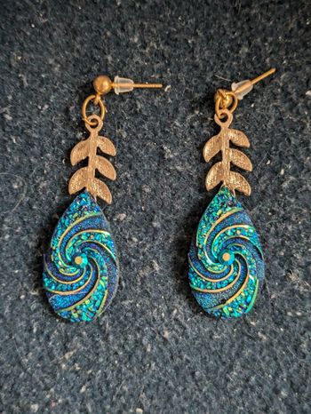 Boucles d'oreilles fantaisie a strass bleus