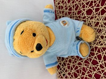 Doudou winnie pyjama bleu bonnet DISNEY