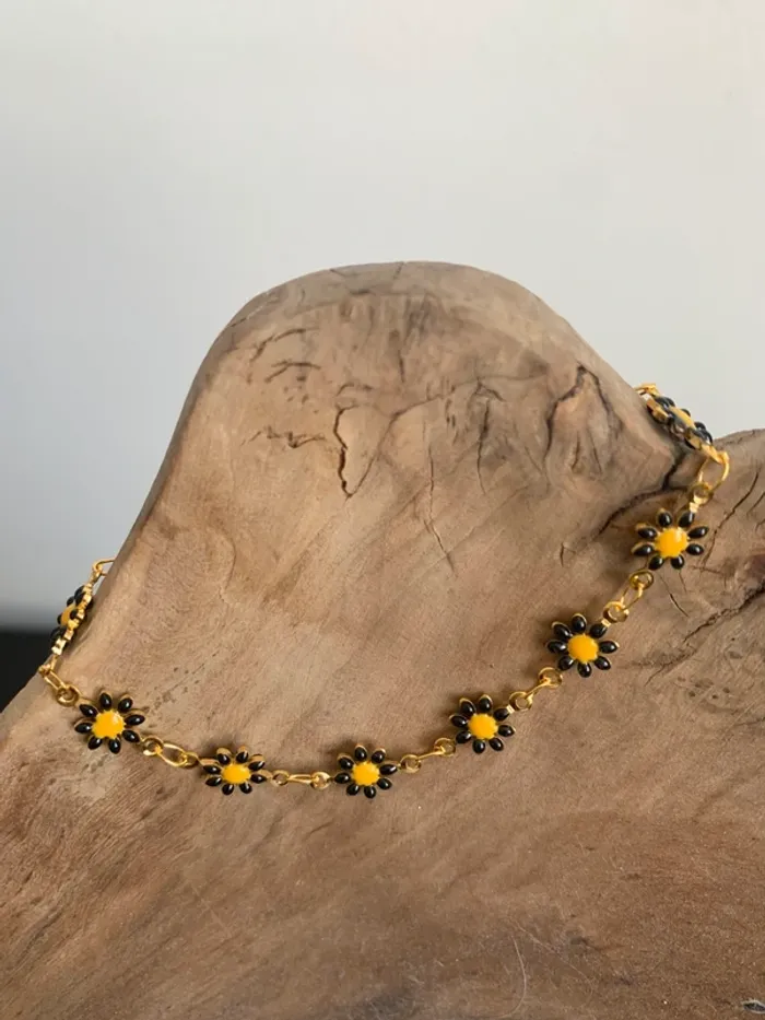 Joli bracelets doré avec pâquerettes Neuf - photo numéro 1