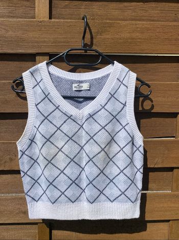 Pull sans manche à carreaux