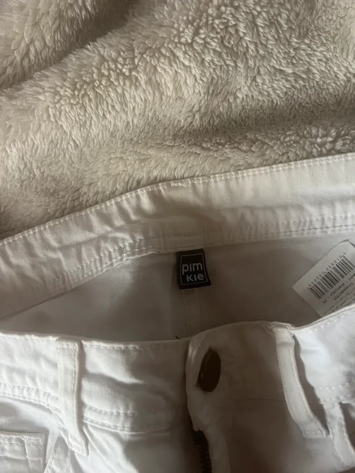 Pantalon blanc avec fermeture éclair en bas de jambe - photo numéro 5