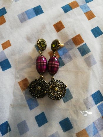 1 paire de boucles d oreilles