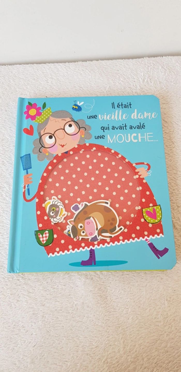 Livre il était une vieille dame qui avait avalé une mouche - photo numéro 1