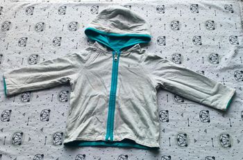 Veste réversible taille 6 mois