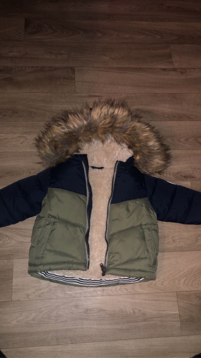 Doudoune 6 mois état neuf