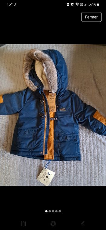 Manteau neuf 9mois