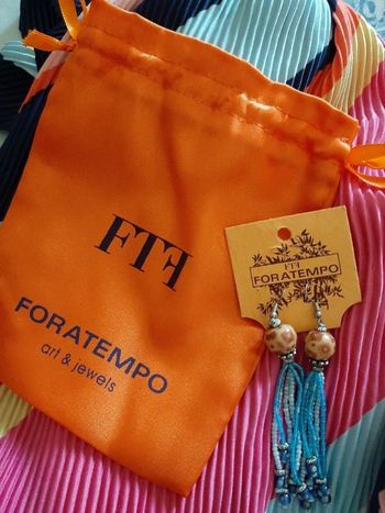 Boucle d'oreille Foratempo neuf