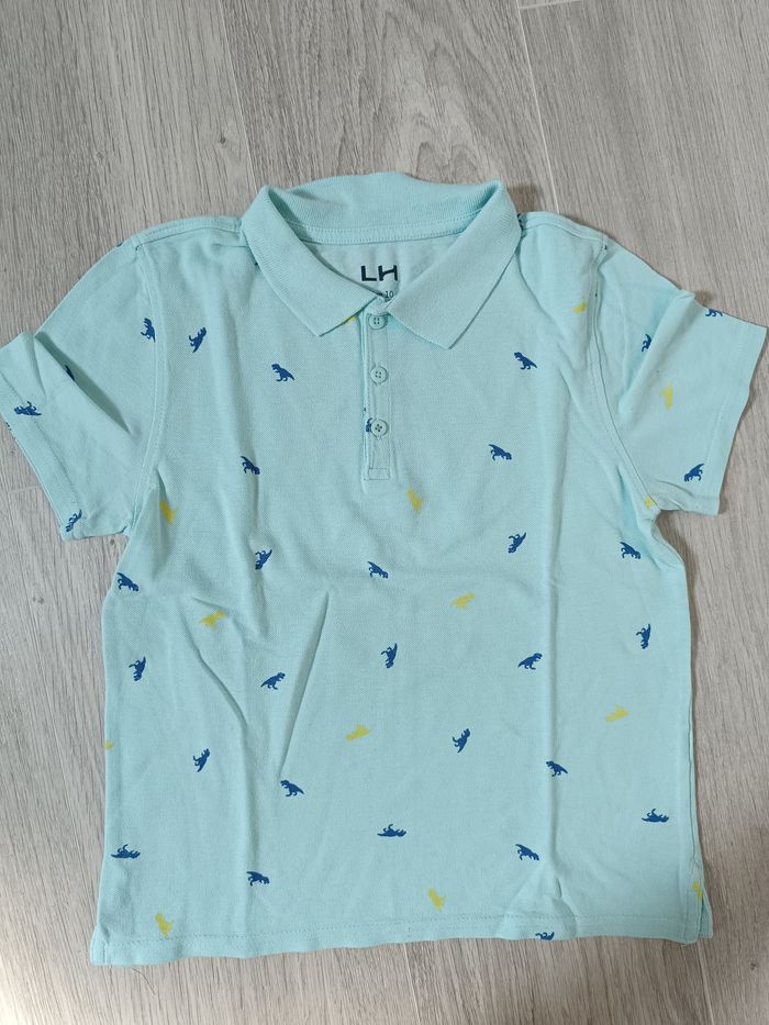 Polo manches courtes motifs dinosaures 10 ans