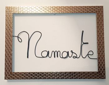 Cadre doré"Namaste" fabrication artisanale, en fil de fer