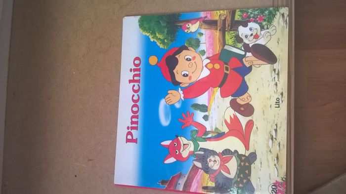 lot de 3 livres enfants : les 101 dalmatiens+pinocchio+ les trois petits cochons - photo numéro 2