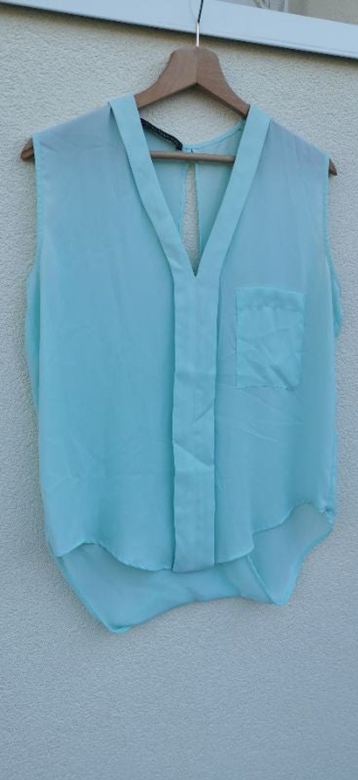 Blouse sans manche, dos ouvert