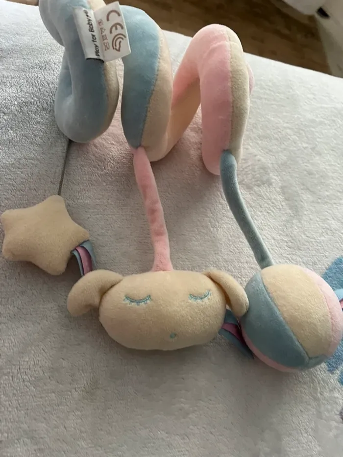 Jouet siège bébé ou poussette excellent état très peut servi