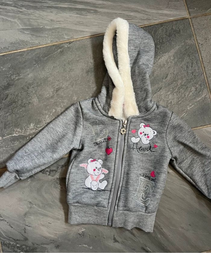 Gilet à capuche