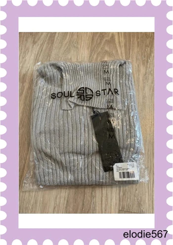 Pull col roulé