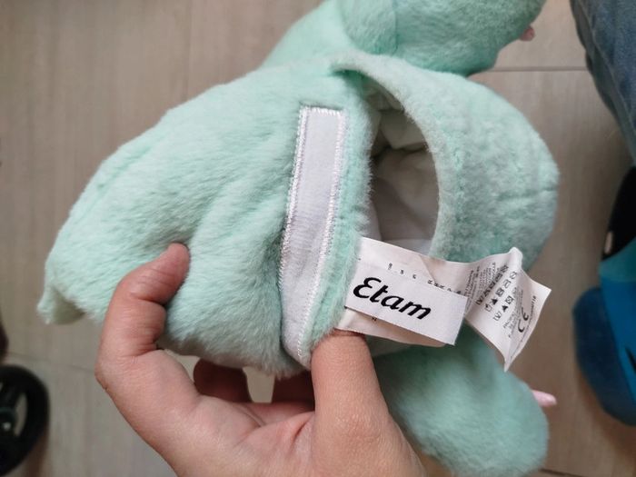 Peluche dinosaure range pyjama - photo numéro 3