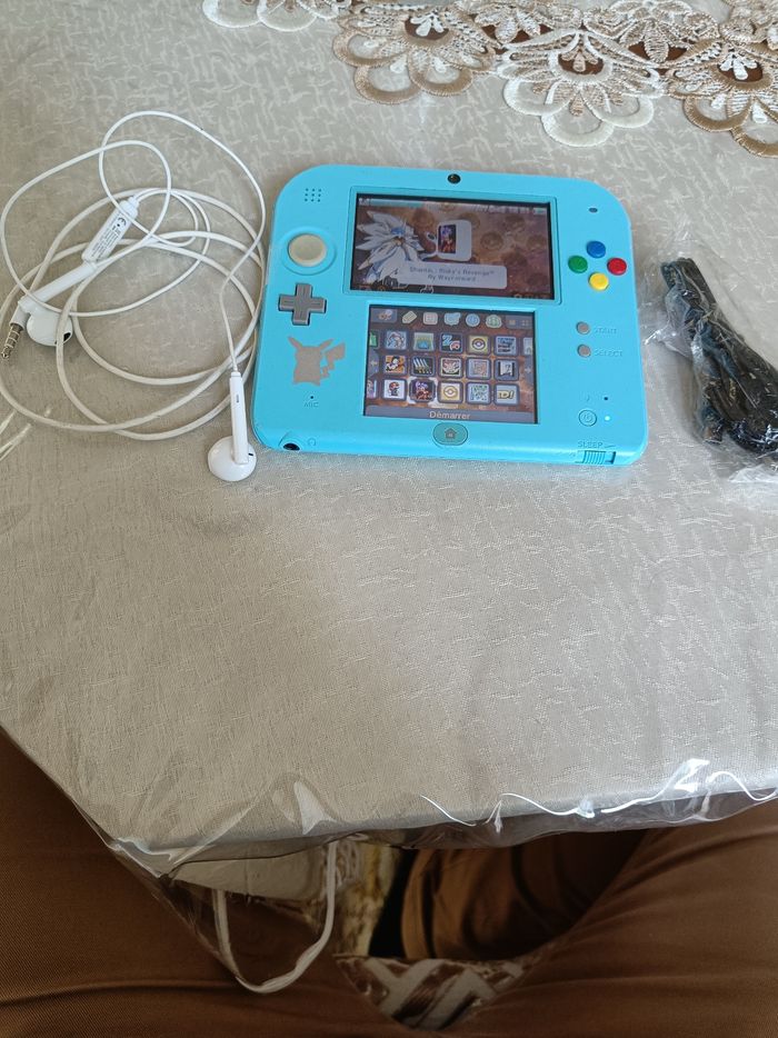 Nintendo 2ds édition limitée pokemon avec 28 jeux. - photo numéro 10